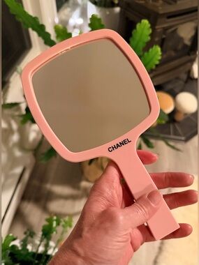 This VERY RARE Chanel BEAUTE Pink Handheld Mirror comes NEW in BOX.